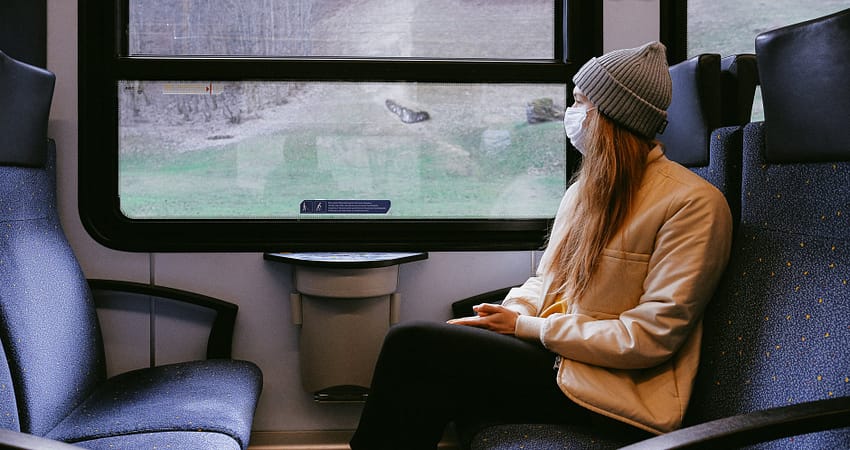 woman wearing mask on train